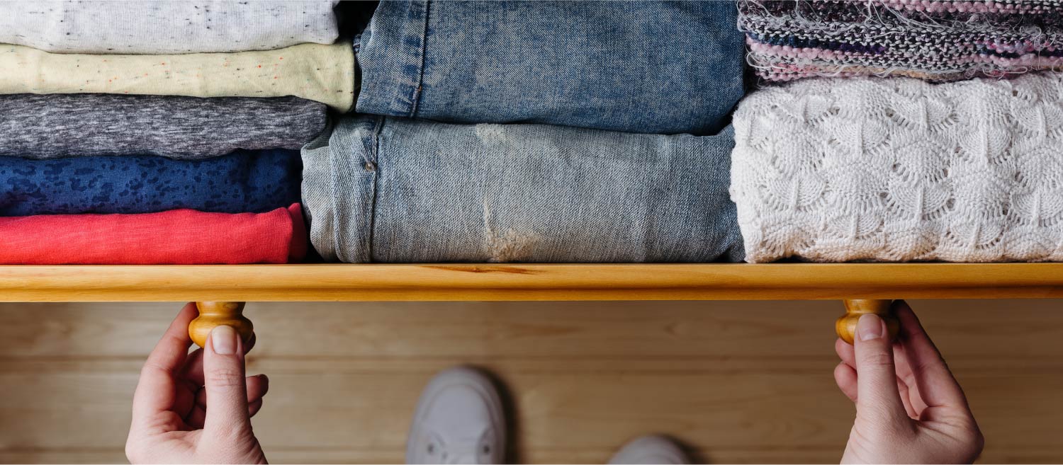 Premium Photo  Stack of wool cloth on shelf